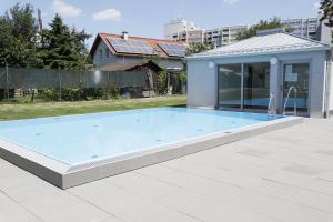 The swimming pool at or close to Rooftop Terrace, free garage parking and Pool!