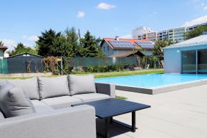 The swimming pool at or close to Rooftop Terrace, free garage parking and Pool!