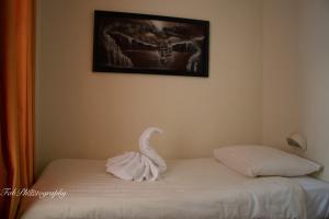 Postel nebo postele na pokoji v ubytování Hotel 2000 Valkenburg