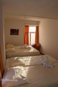 Postel nebo postele na pokoji v ubytování Hotel 2000 Valkenburg