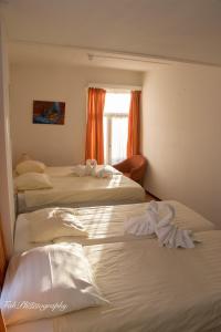 Postel nebo postele na pokoji v ubytování Hotel 2000 Valkenburg