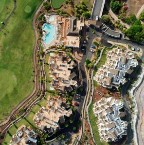 an aerial view of a group of houses at Las Terrazas de Abama Suites in Guía de Isora