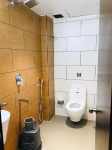 Um banheiro em Hotel Flora Suites - Fort
