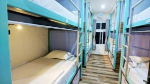 Ένα ή περισσότερα κρεβάτια σε δωμάτιο στο Hostel Nepal Pvt Ltd