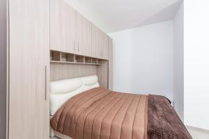 Krevet ili kreveti u jedinici u objektu The Terraces 3 Bedroom Apartment