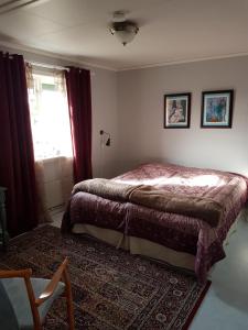 Letto o letti in una camera di Skogsbrynet B&B, Bredsjö Nya Herrgård