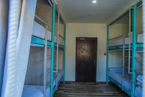 Ένα ή περισσότερα κρεβάτια σε δωμάτιο στο Hostel Nepal Pvt Ltd
