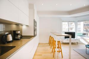 Kuchyňa alebo kuchynka v ubytovaní Apartamentos San Marcial 28