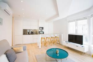 Kuchyňa alebo kuchynka v ubytovaní Apartamentos San Marcial 28