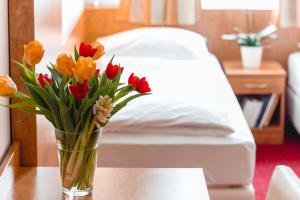 Łóżko lub łóżka w pokoju w obiekcie Hotel Allegro Wien