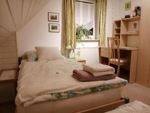Voodi või voodid majutusasutuse Ferienhaus Hooksiel toas