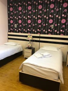 Voodi või voodid majutusasutuse Hotel For You toas