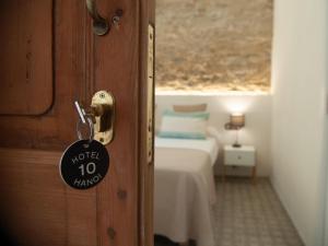 Postel nebo postele na pokoji v ubytování Hotel Hanoi