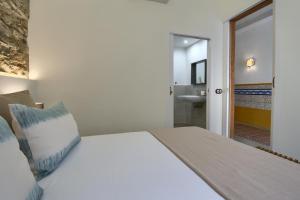 Postel nebo postele na pokoji v ubytování Hotel Hanoi