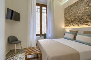 Postel nebo postele na pokoji v ubytování Hotel Hanoi
