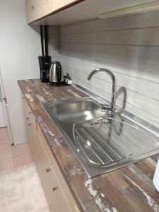 Kuchyň nebo kuchyňský kout v ubytování Deppy's Apartments