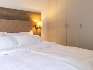 Postel nebo postele na pokoji v ubytování Premium Green Apartments Vienna