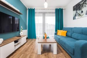 Telewizja i/lub zestaw kina domowego w obiekcie City of the Kings - Wolf Apartment