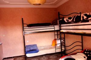 Postel nebo postele na pokoji v ubytování Afgo Hostel