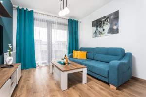Telewizja i/lub zestaw kina domowego w obiekcie City of the Kings - Wolf Apartment