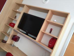TV a/nebo společenská místnost v ubytování B&B La Favola