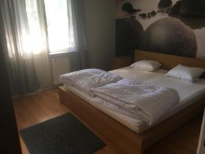 Postel nebo postele na pokoji v ubytování Villa Aspedalsgatan