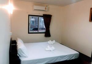 Tempat tidur dalam kamar di Golden Bee PhiPhi
