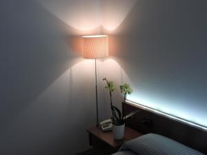 Posteľ alebo postele v izbe v ubytovaní Albergo Centrale