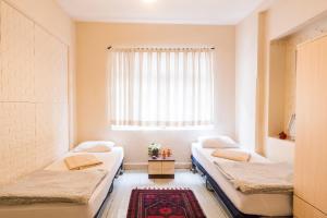 Postel nebo postele na pokoji v ubytování Levanten Hostel