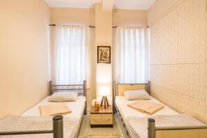 Postel nebo postele na pokoji v ubytování Levanten Hostel