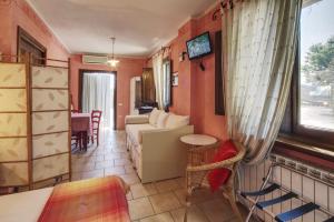 A television and/or entertainment centre at Cascina La Commenda