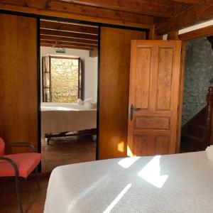 Postel nebo postele na pokoji v ubytování Casa Cuco