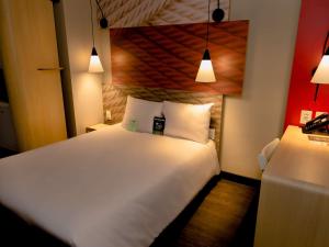 Letto o letti in una camera di Ibis Lorena - Circuito da Fé