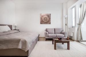Posteľ alebo postele v izbe v ubytovaní Viktoria design studio apartment