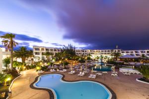an image of a resort pool at night at BlueBay Lanzarote in Costa Teguise
