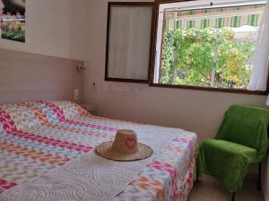 Hôtel Punta e Mare des Chambres ou des Appartements T2客房内的一张或多张床位