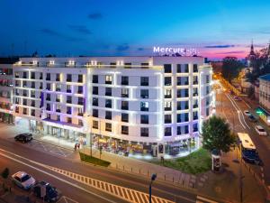 a large building that has a lot of windows at Mercure Krakow Stare Miasto in Krakow
