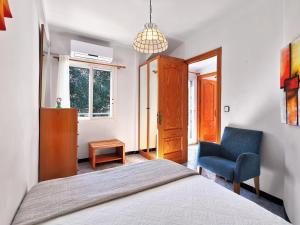 Postel nebo postele na pokoji v ubytování Villa Divuit Pins