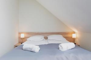 Postel nebo postele na pokoji v ubytování Nawigator SPA