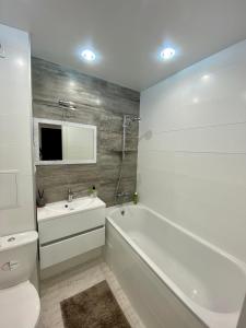 Ванна кімната в Свежая и красивая квартира!