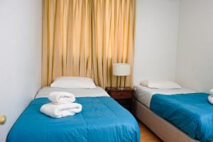 Cama o camas de una habitación en ExMonarca by Design