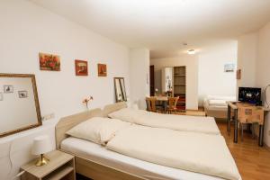 Katil atau katil-katil dalam bilik di Gasthof / Pension Götzfried +25 gambar