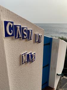 a casa do mar sign on the side of a building at CASA DO MAR in Jardim do Mar
