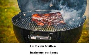 a steak and bacon cooking on a grill at Ferienwohnung Payr in Patergassen