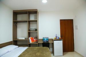 Kaluff Hotel客房内的一张或多张床位