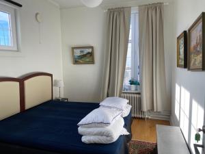Postel nebo postele na pokoji v ubytování Vänersborgs Vandrarhem + 4 fotografie