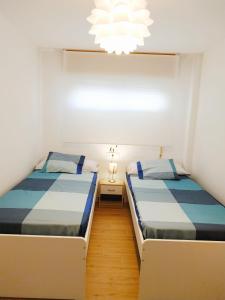 Postel nebo postele na pokoji v ubytování Apartamento Cruise Views