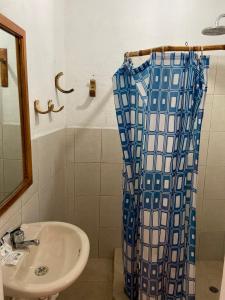 Koupelna v ubytování Hotel Karukera