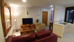 Televízia a/alebo spoločenská miestnosť v ubytovaní Apartamento Jerez Terraza Privada