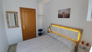 Posteľ alebo postele v izbe v ubytovaní Apartamento Jerez Terraza Privada